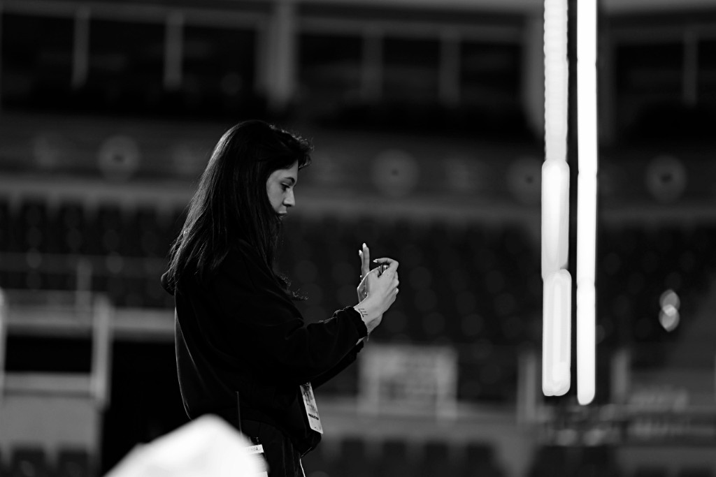 Senanur Saglam documenting a live arena production on site